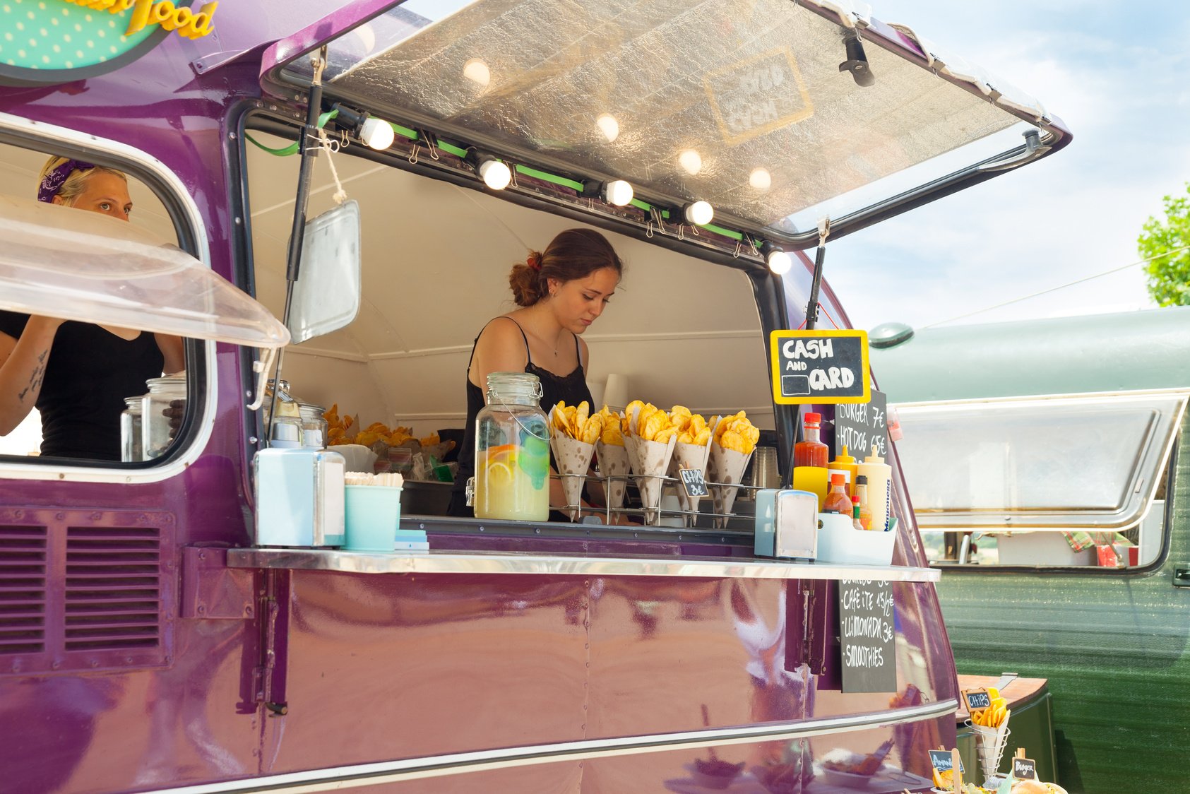 Food truck and happy owners